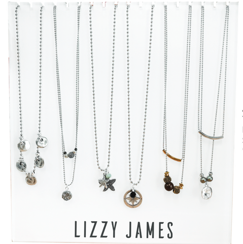 Collection of necklaces with various pendants on a white background, branded as Lizzy James.