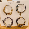 Four bracelets on a Lizzy James branded card.