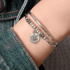 Pancake Silver & Leather Adjustable Size Bracelet shown w the Silver Sand Dollar charm