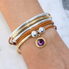 Amethyst Purple Crystal Charm in Gold shown on the Girlfriend Wrap in Gold and Silver (sold separately)