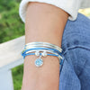 Aquamarine Blue Crystal Charm shown on the Girlfriend Wrap Add Your Charm Choice in Gloss Sky Blue Leather (sold separately)