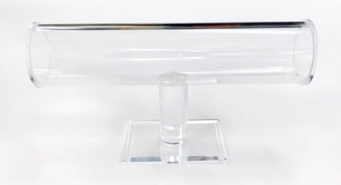 A clear acrylic T bar display stand with a flat base and a cylindrical holder in the center.