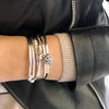 Double Love with Puffed Heart Charm shown in natural black leather