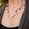 Jemma shown in gloss navy leather