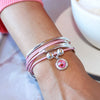 Tourmaline Pink Crystal Charm shown on the Girlfriend Wrap in Metallic Pink Leather (sold separately)