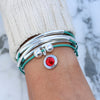 Ruby Red Crystal Charm shown on the Girlfriend Wrap Add Your Charm Choice (sold separately)