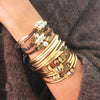 Ginger gold stacked with London and Paris bracelets and Lizzy Classic 4 strand gold silver, each sold separately