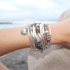 Shell Charm as shown on the Love Wrap stacked next to the Mini Infinity wrap and Mini Medley (each sold separately)