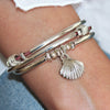 Shell charm as shown on the Love wrap bracelet (sold separately) 